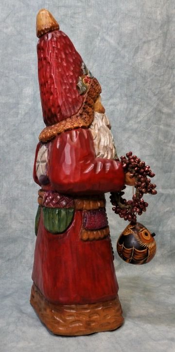 Father Christmas wood carving with long white beard