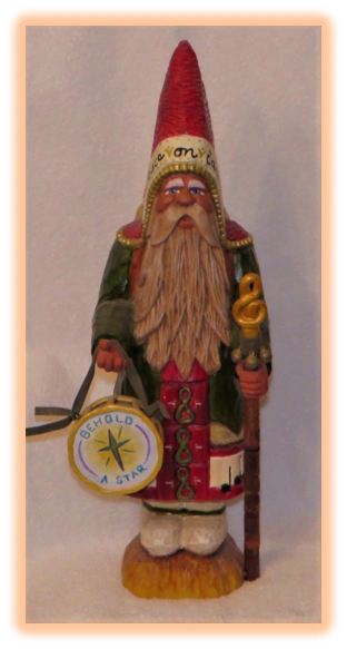 Father Christmas wood carving with detailed painted features