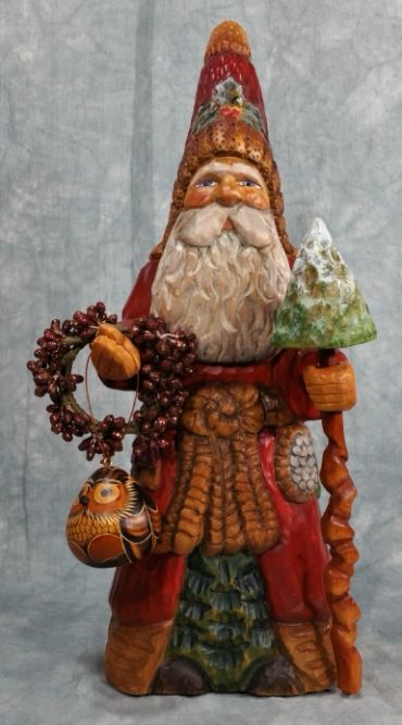 Father Christmas carving in warm earth tones