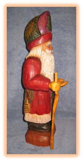 Father Christmas wood carving, tall figure in traditional attire
