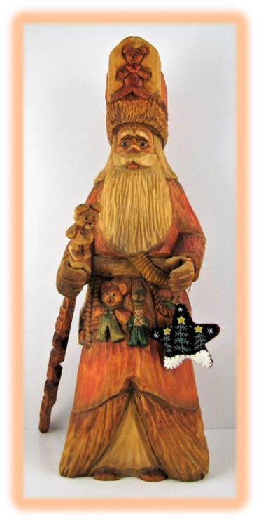 Father Christmas wood carving with expressive painted face