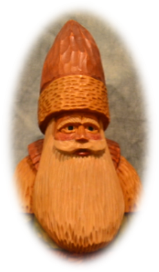 Father Christmas carving with tall figure and expressive painted face