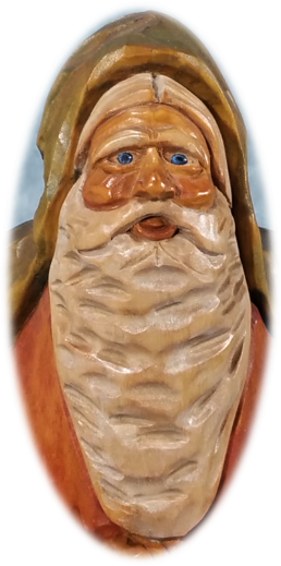 Full figure Father Christmas carving with detailed face and long robe
