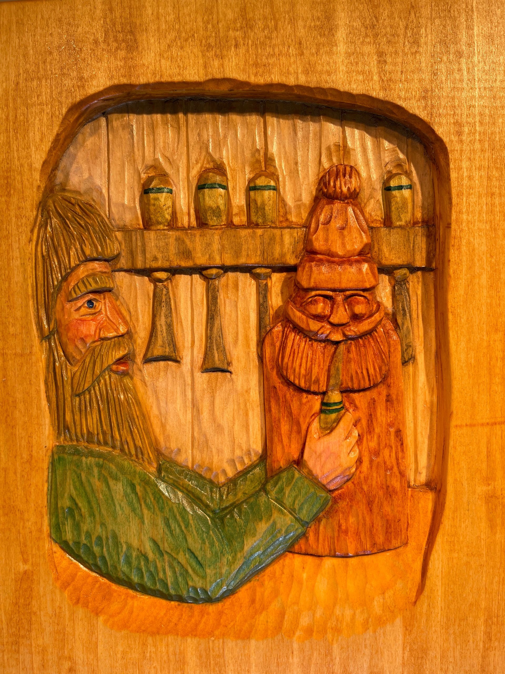 The Forever Wreath illustrated page — carved scene from the children's story