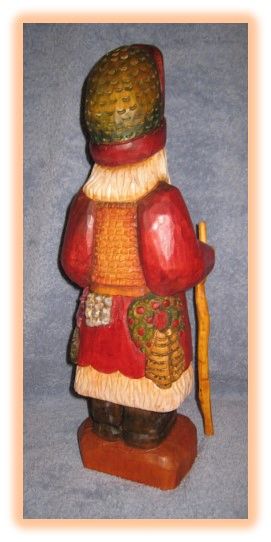 Father Christmas wood carving, side profile view