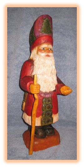 Father Christmas wood carving in warm tones